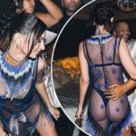 Emily Ratajkowski twerks in a daring sheer dress which shows off her bra and thong as she larks around with pals at a star-studded Met Gala afterparty