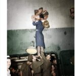 “Actress Marlene Dietrich kisses a soldier returning home from war, 1945”