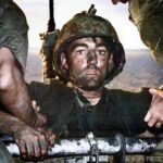 A U.S. Marine exhibits the thousand-yard stare after two days of constant fighting in the Battle of Eniwetok, 1944.