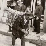 A drunken man placed in a basket and carried away, Istanbul, 1960s.⁣