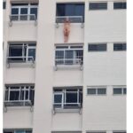 Undressed woman was observed standing on ledge outside kitchen window of HDB building in Yishun before she jumped to her death.